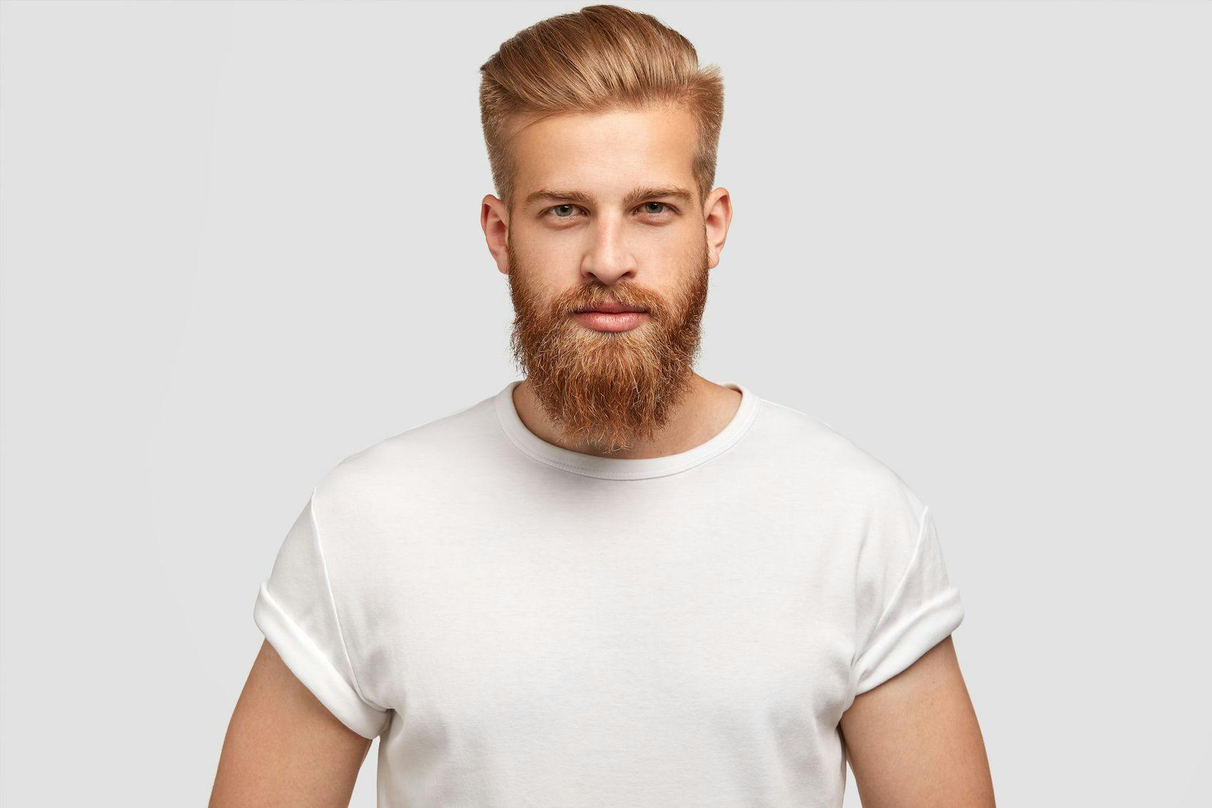 Man with thick hair and beard